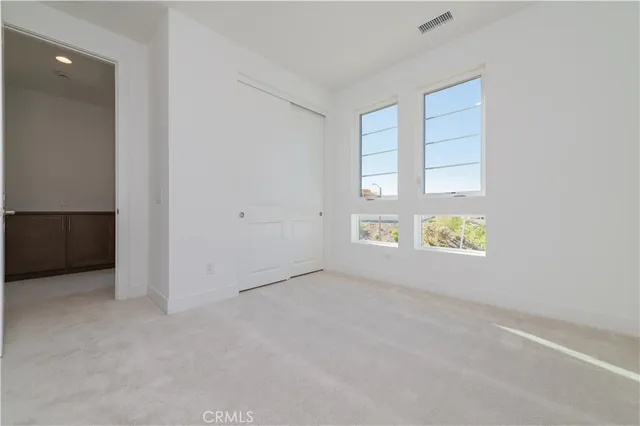 a bathroom with a sink toilet vanity and bathtub