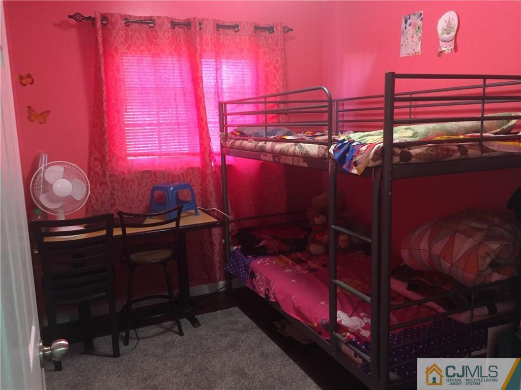 47 Blair Road Carteret, NJ 07008 - Photo 14 of 23 a room with musical instruments