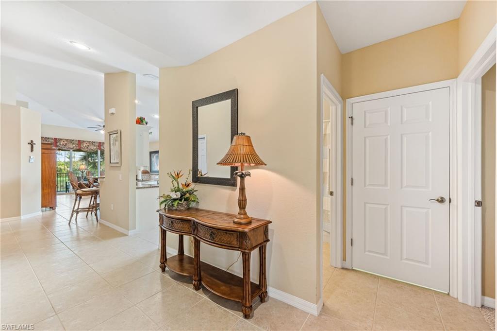 20051 Seagrove Street, Unit 1208 Estero, FL 33928 - Photo 11 of 25 a view of a livingroom with furniture and front door