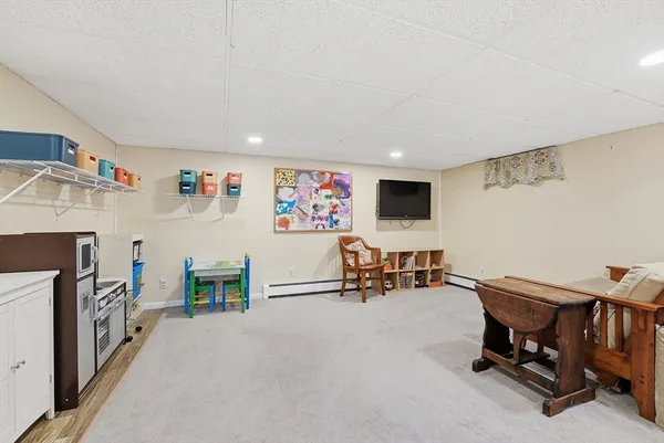 a view of a livingroom with furniture and a couch