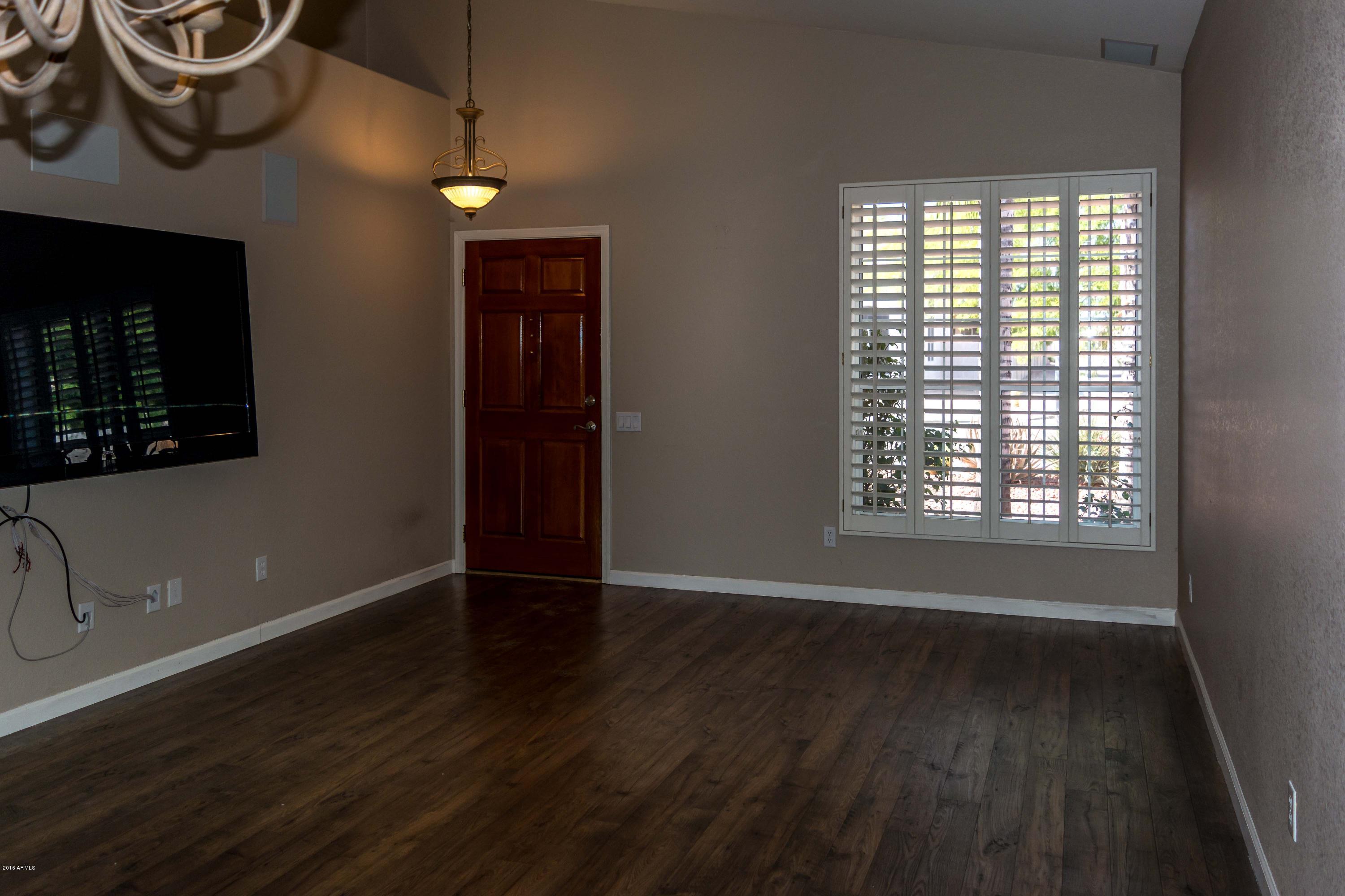 103 West Grandview Road Phoenix, AZ 85022 - Photo 5 of 9 Entry & Living Room with Viseo Smart TV