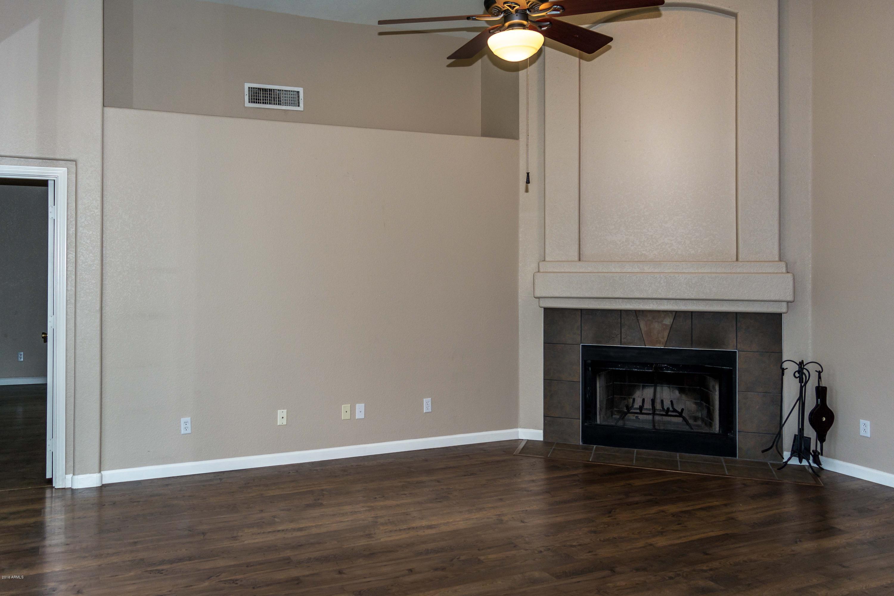 103 West Grandview Road Phoenix, AZ 85022 - Photo 6 of 9 Family Room & Wood Burning Fireplace