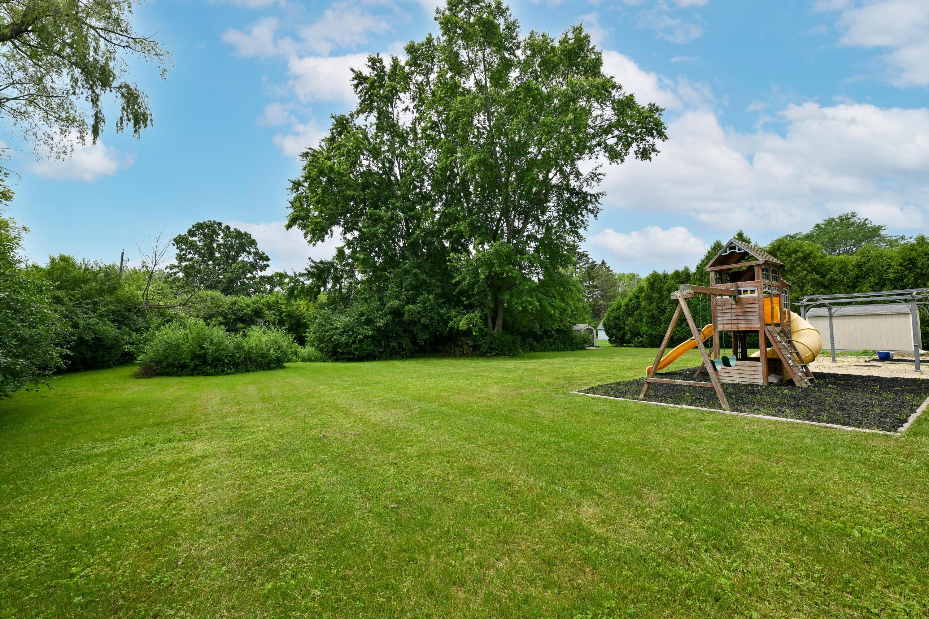 1933 West Donges Bay Road Mequon, WI 53092 - Photo 32 of 36 Wooden playset included!