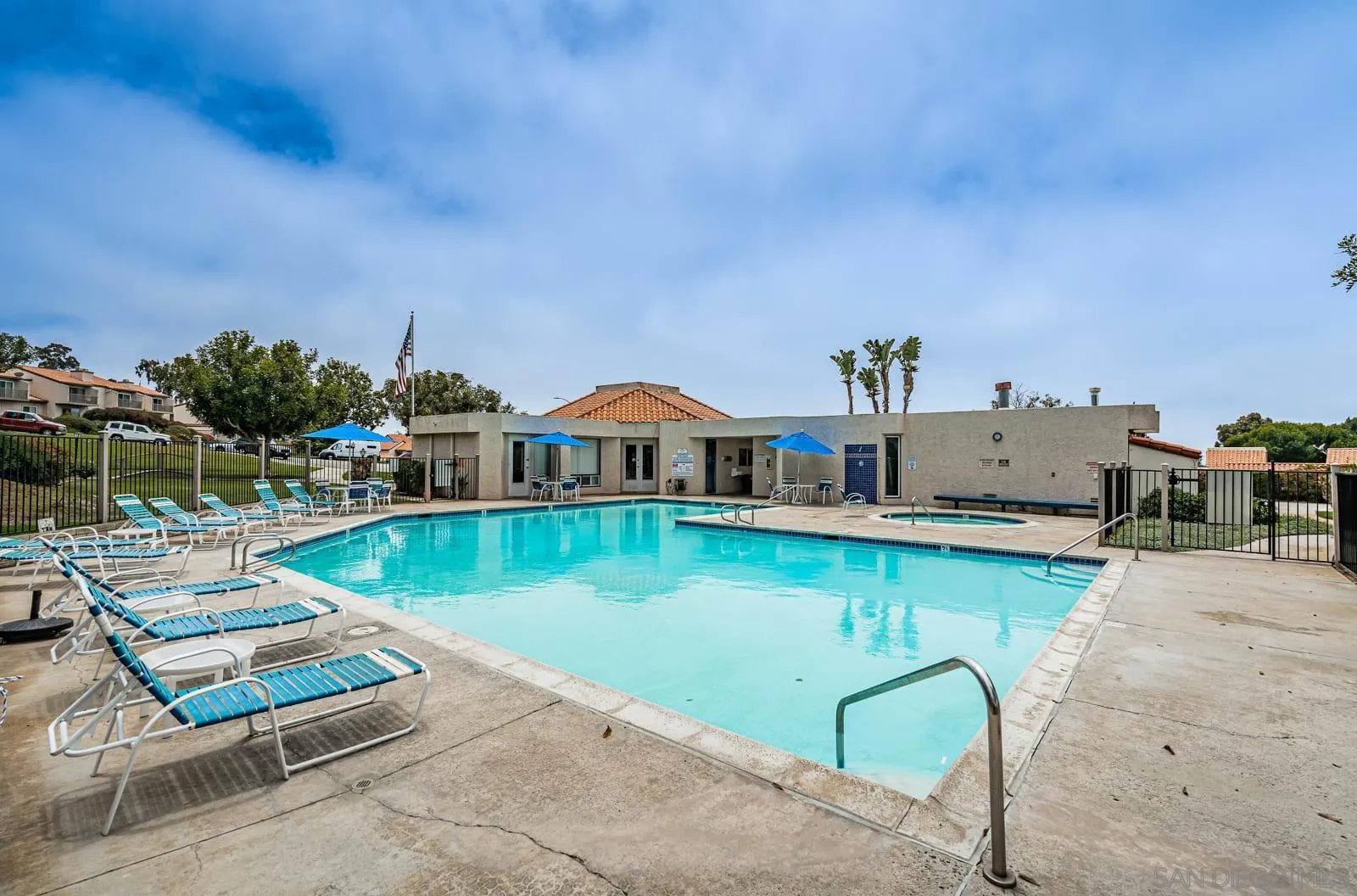 901 Caminito Madrigal, Unit E Carlsbad, CA 92011 - Photo 28 of 28 an aerial view of a house with swimming pool having outdoor seating