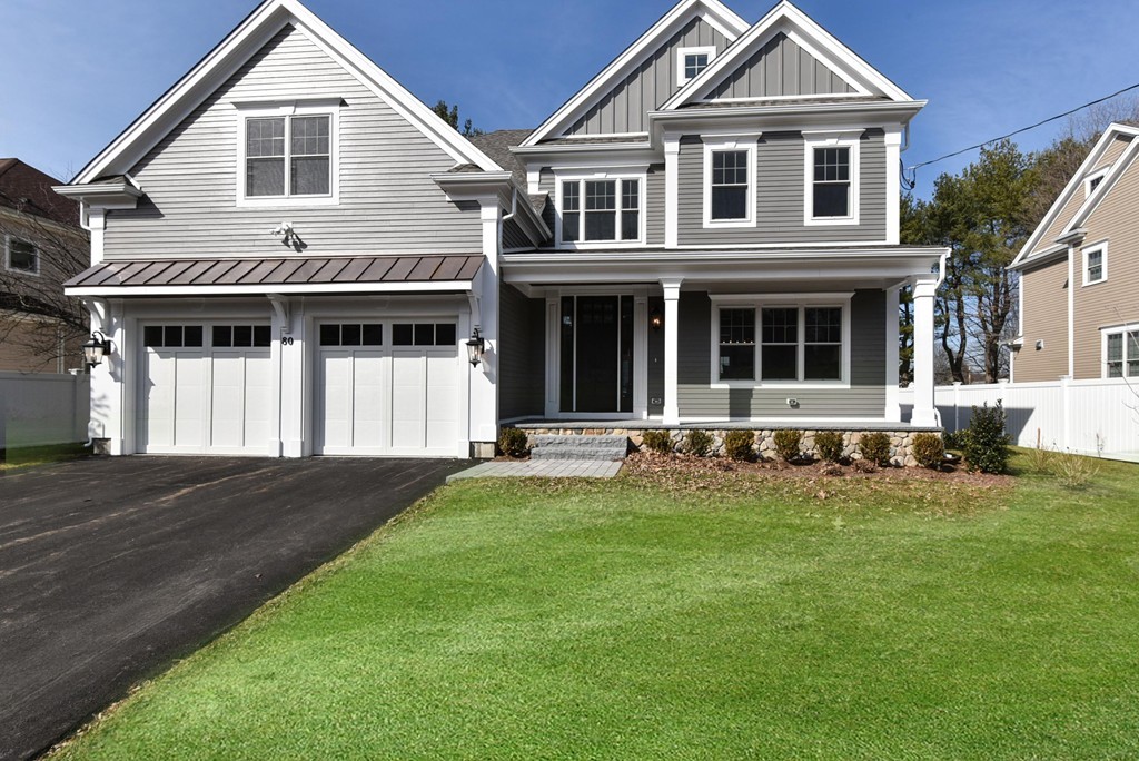 80 Evelyn Road Needham, MA 02494 - Photo 1 of 29 a front view of a house with a yard