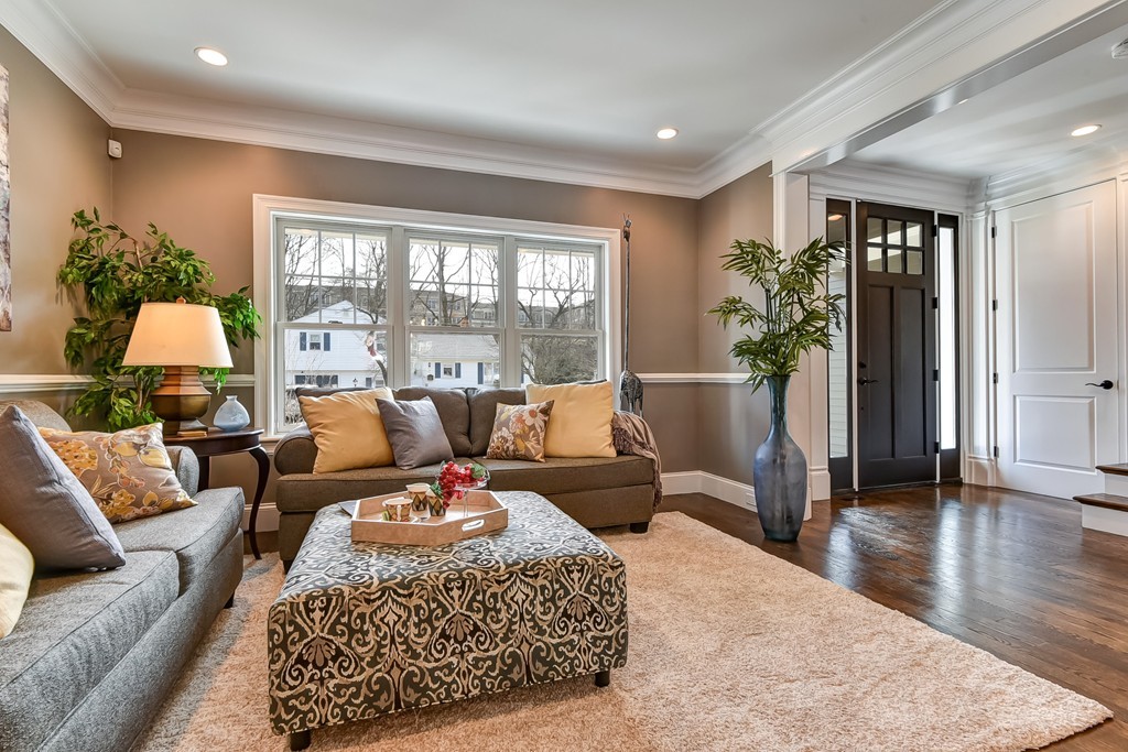 80 Evelyn Road Needham, MA 02494 - Photo 13 of 29 a living room with furniture and a large window