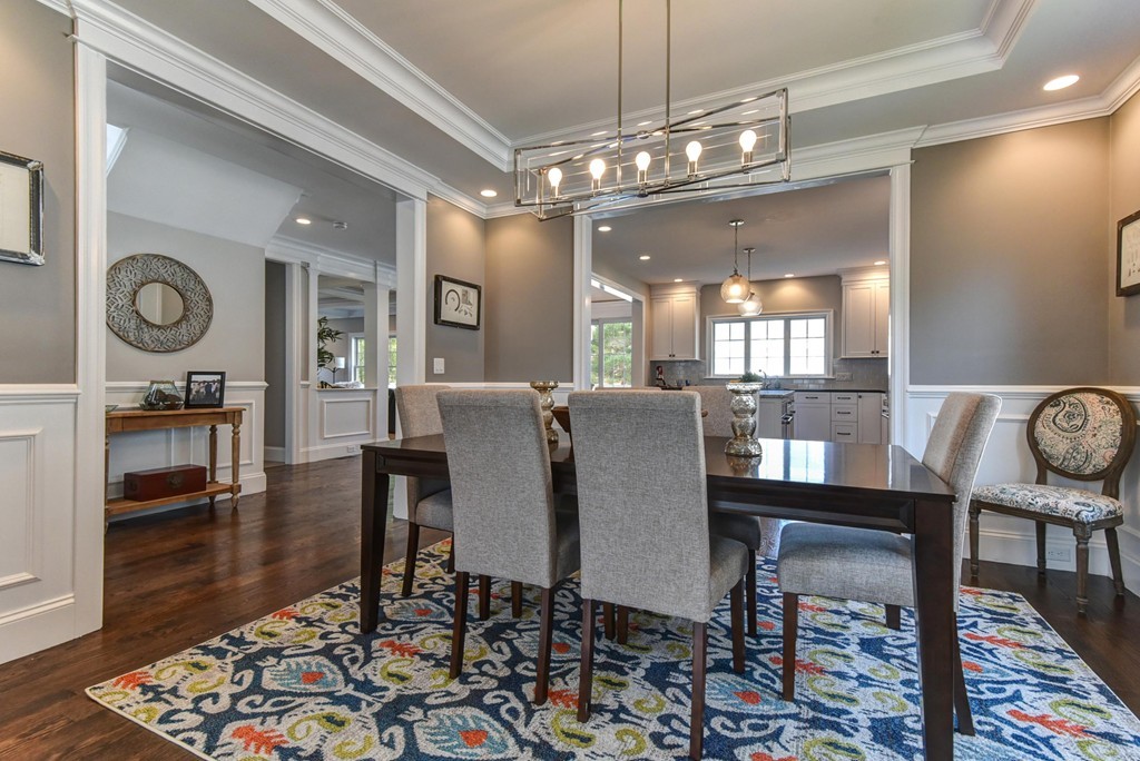 80 Evelyn Road Needham, MA 02494 - Photo 14 of 29 a view of a dining room with furniture and wooden floor