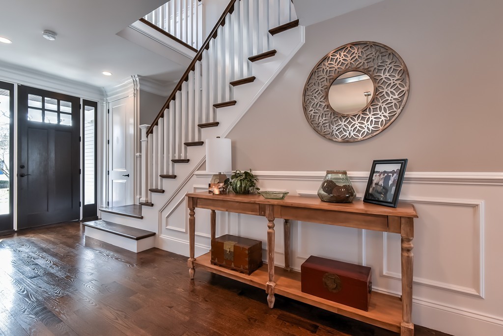 80 Evelyn Road Needham, MA 02494 - Photo 16 of 29 a view of a hallway with entryway wooden floor and front door