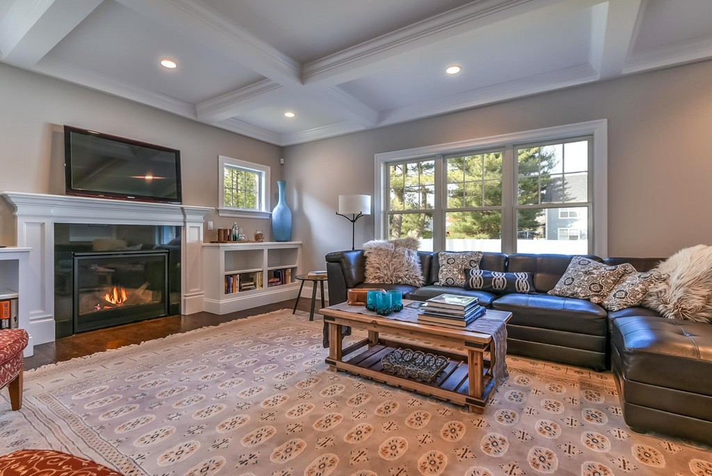 80 Evelyn Road Needham, MA 02494 - Photo 20 of 29 a living room with furniture and a fireplace