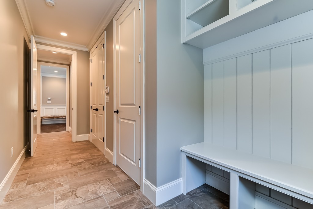 80 Evelyn Road Needham, MA 02494 - Photo 23 of 29 a view of a hallway with wooden floor