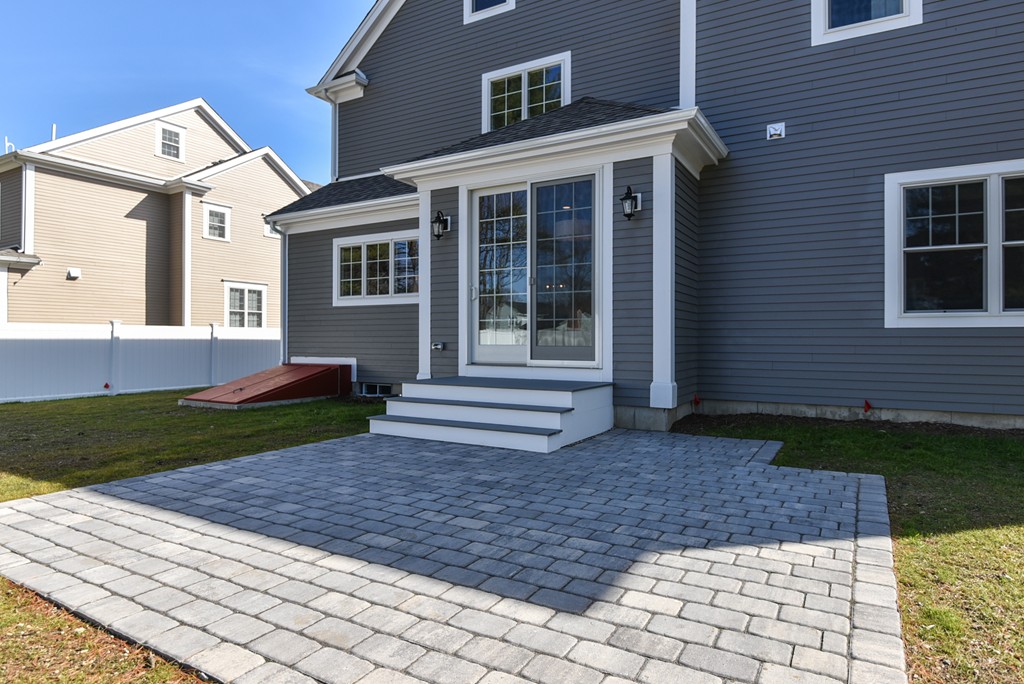 80 Evelyn Road Needham, MA 02494 - Photo 29 of 29 a front view of a house with a yard