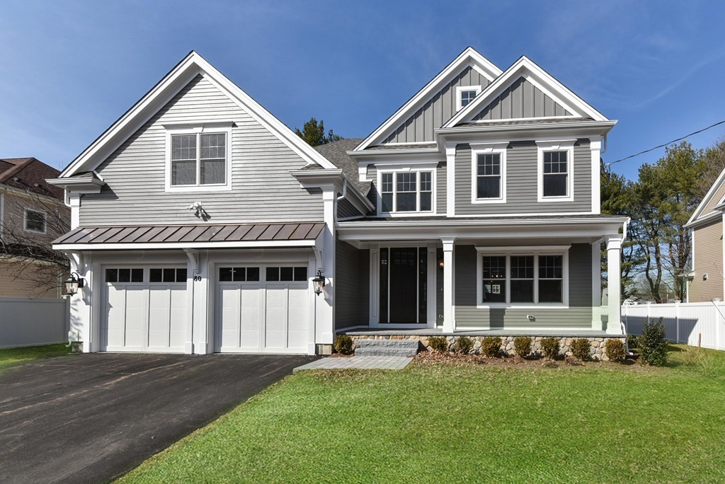 80 Evelyn Road Needham, MA 02494 - Photo 3 of 29 a front view of a house with a yard
