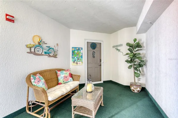 a bedroom with a bed and a view of bathroom