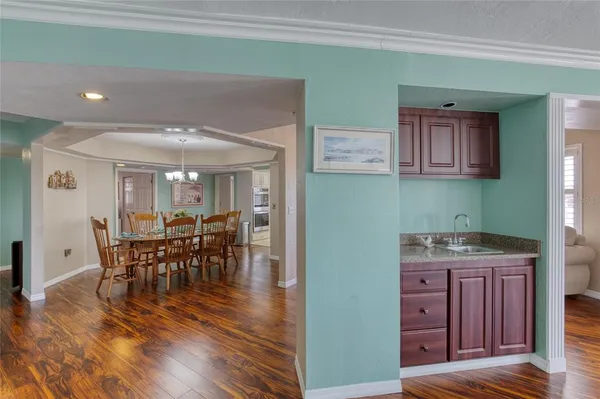 a en suite bathroom with a sink and mirror