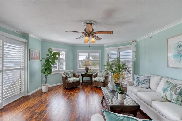 a bathroom with a granite countertop toilet sink and mirror
