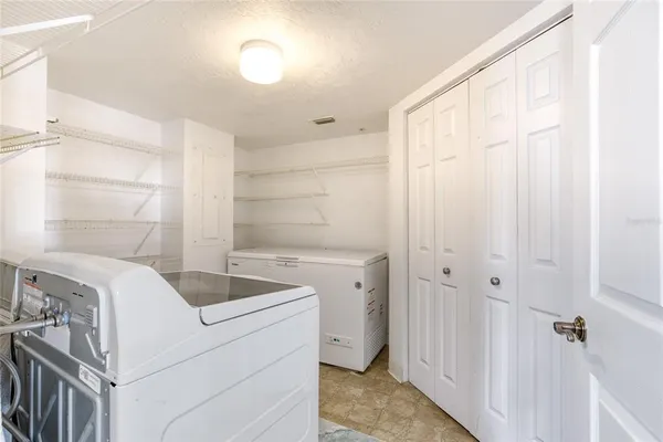 a bathroom with a sink double vanity and a mirror
