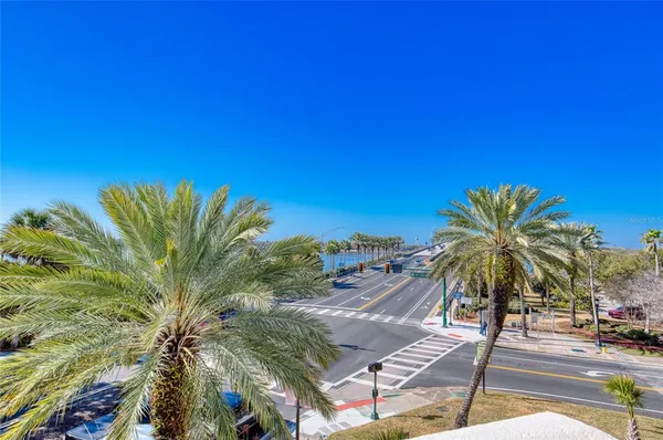 a view of city with ocean
