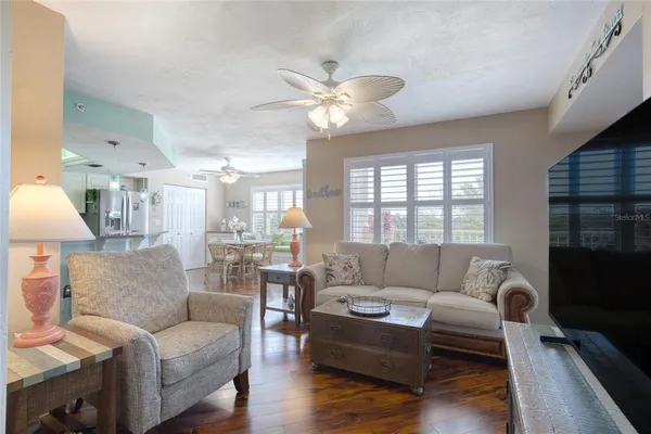 a kitchen with stainless steel appliances granite countertop a sink and a counter space
