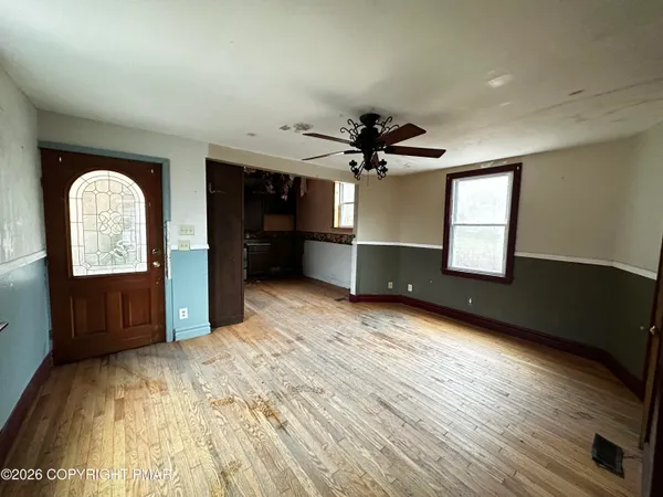 a view of a livingroom with a window