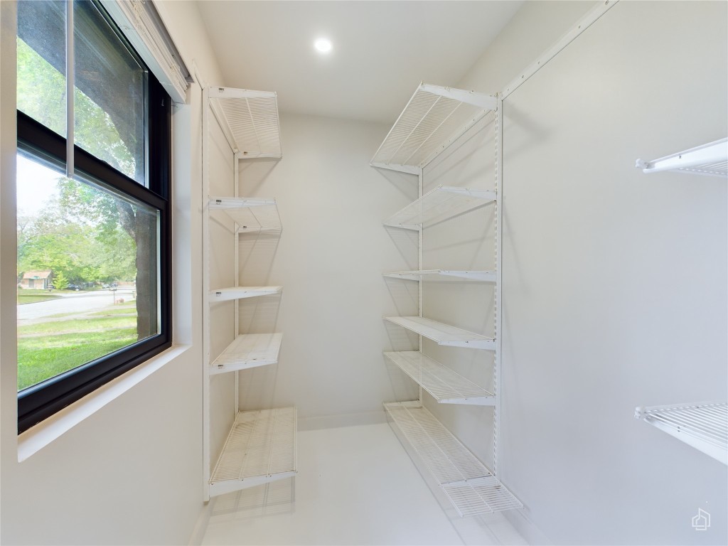 6007 Leisure Run Road Austin, TX 78745 - Photo 19 of 26 a view of a walk in closet
