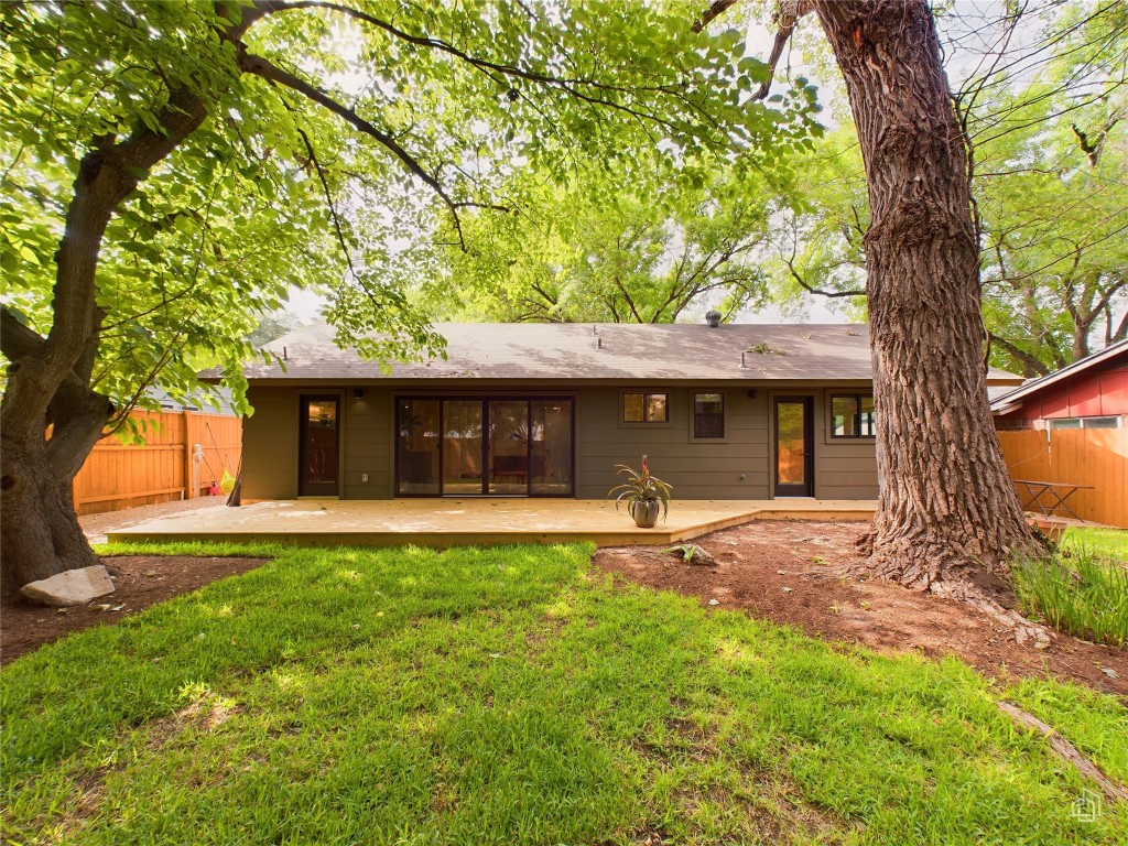 6007 Leisure Run Road Austin, TX 78745 - Photo 25 of 26 a front view of a house with a yard