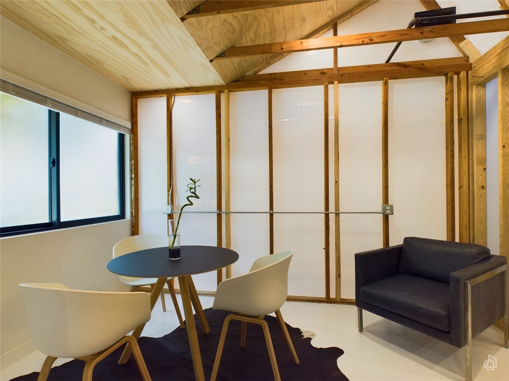 6007 Leisure Run Road Austin, TX 78745 - Photo 7 of 26 a living room with furniture and a window