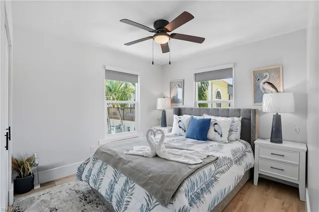 a bedroom with a bed and window