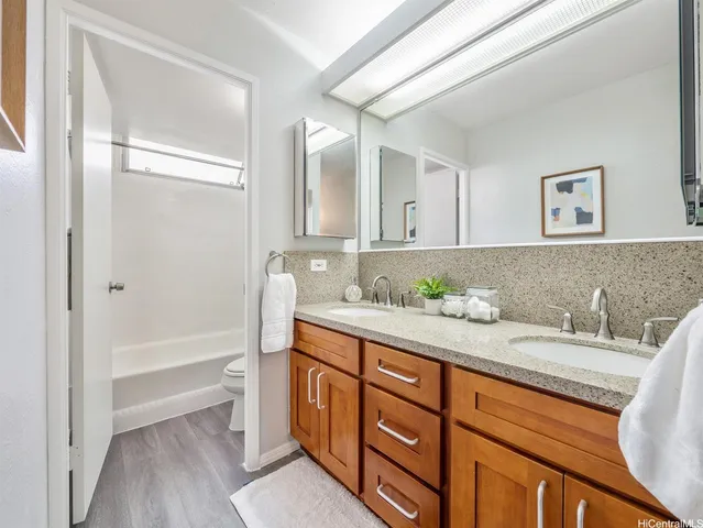 a bathroom with a sink and a bathtub