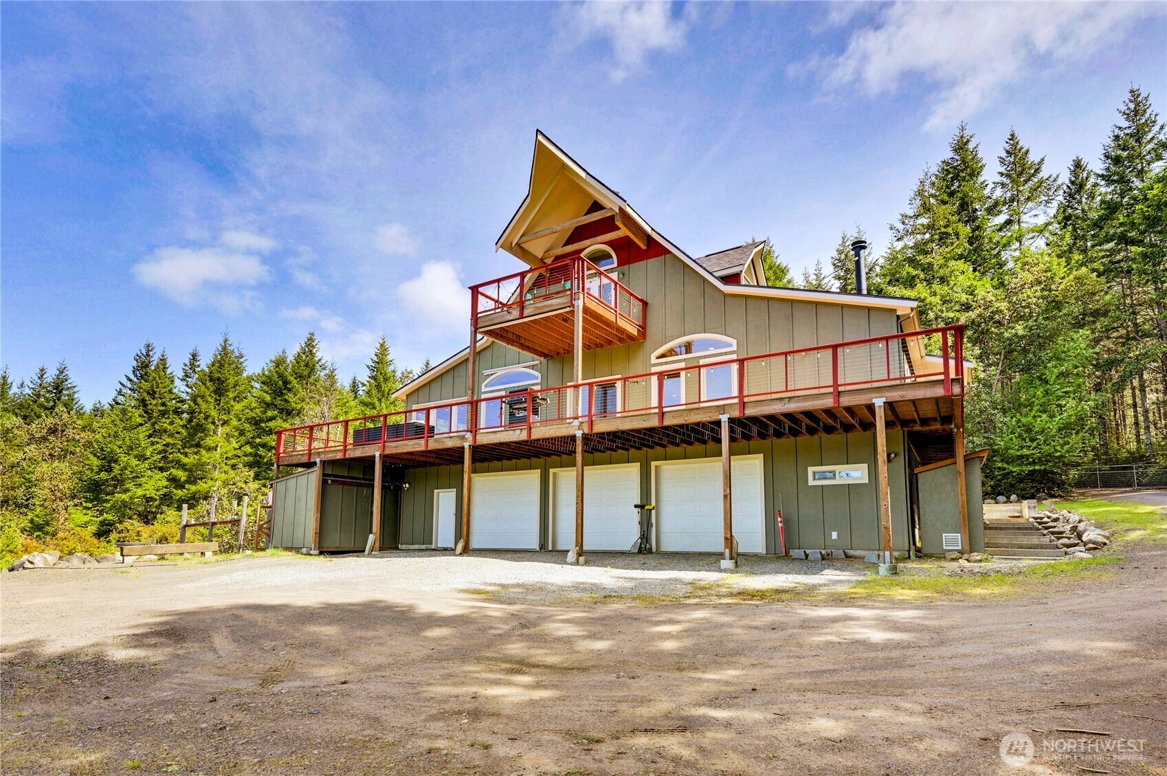 83 Octopus Court Quilcene, WA 98376 - Photo 40 of 40 a view of a house with a yard and potted plants