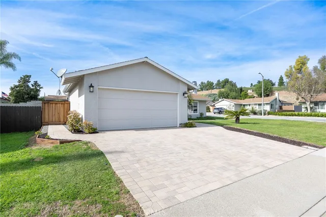 a house view with a garden space