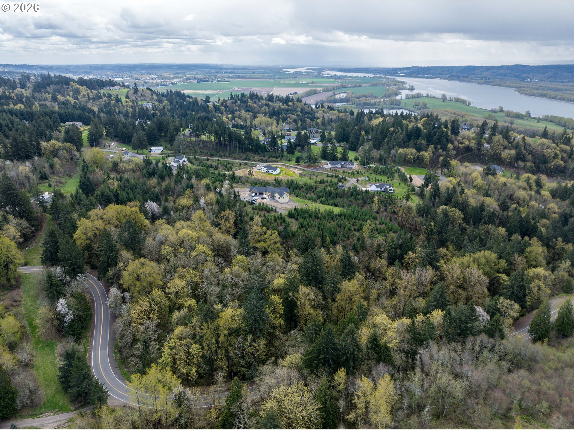 577 Martins Bluff Road Kalama, WA 98625 - Photo 2 of 13 an aerial view of residential houses with outdoor space and trees