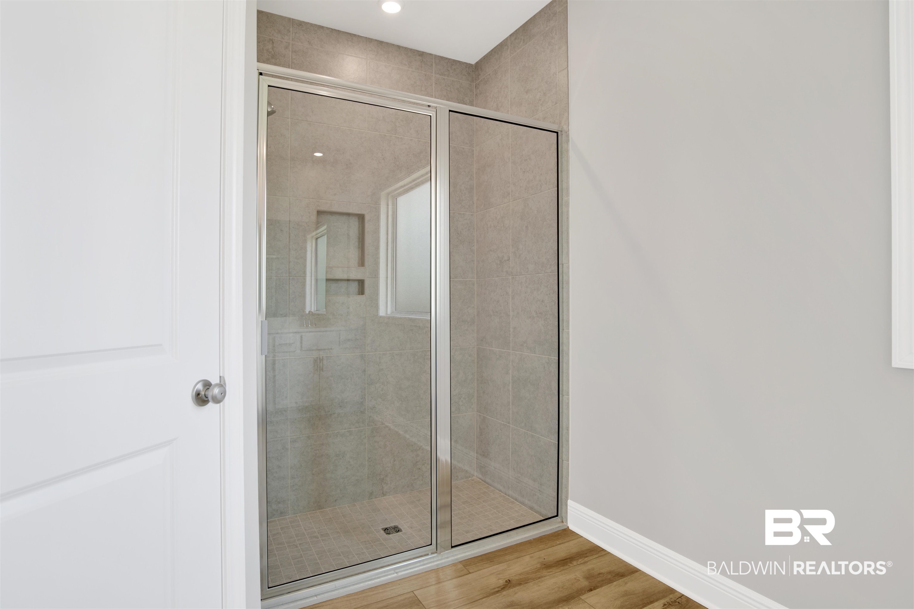 23852 Lafite Circle Daphne, AL 36526 - Photo 20 of 30 Full bath featuring wood finished floors, a stall shower, and recessed lighting