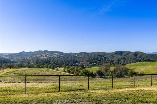 a view of an ocean and city
