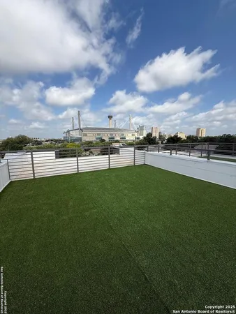 a view of a backyard with barn