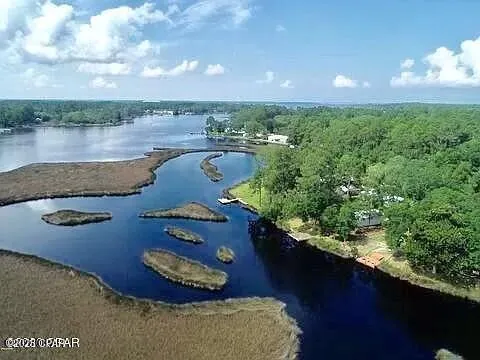 $560,000 | 7424 Little Creek Circle, Southport, FL 32409