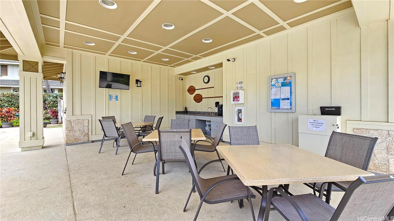 92-1490 Ali'inui Drive, Unit 803 Kapolei, HI 96707 - Photo 18 of 20 a view of a dining room with furniture and window