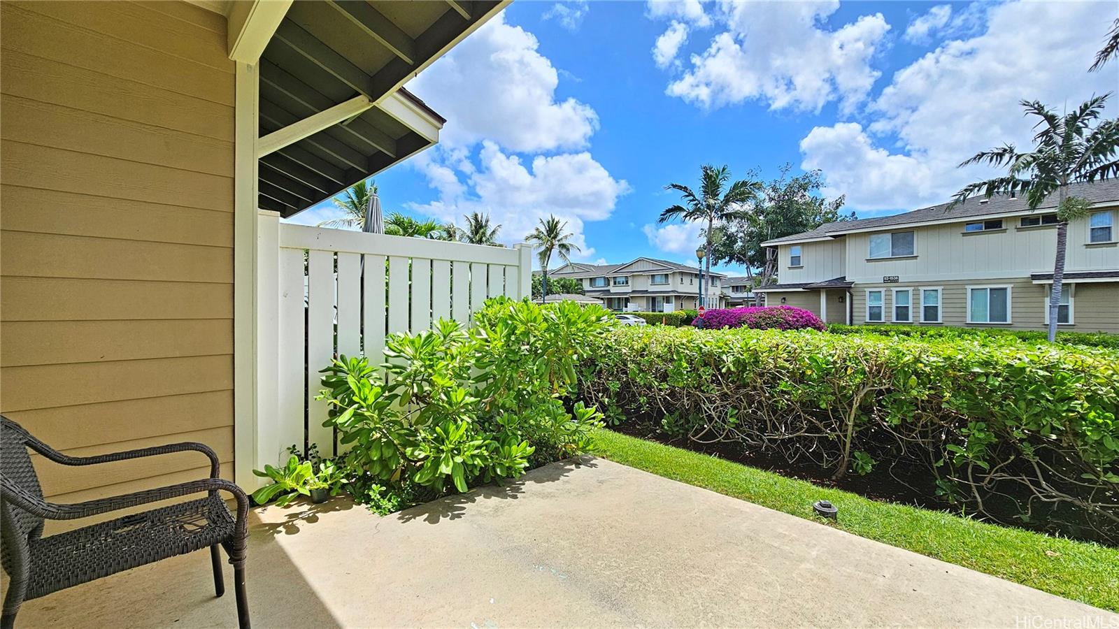 92-1490 Ali'inui Drive, Unit 803 Kapolei, HI 96707 - Photo 9 of 20 a view of a backyard with plants