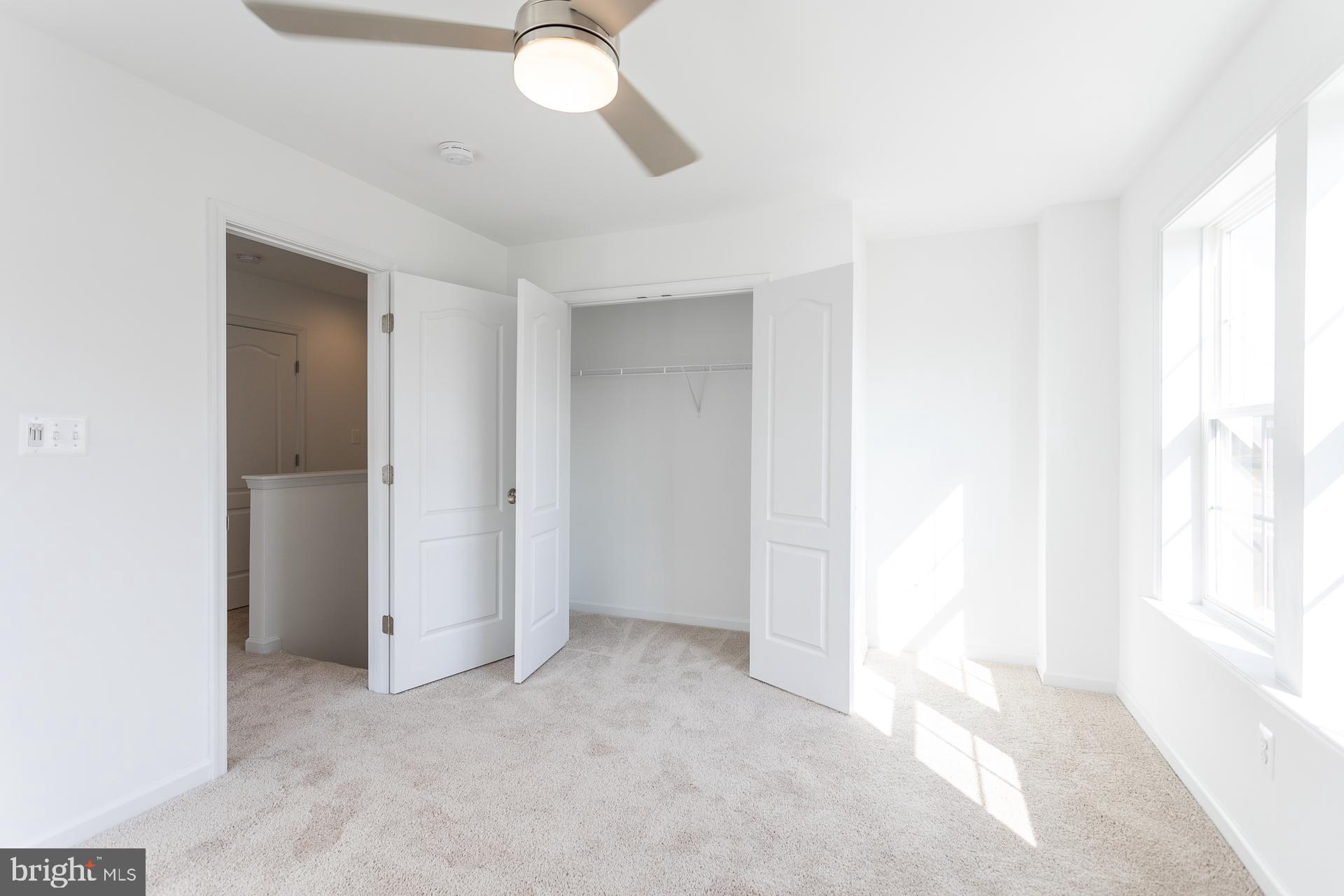 139 Spool Road Inwood, WV 25428 - Photo 15 of 34 a view of an empty room with a window