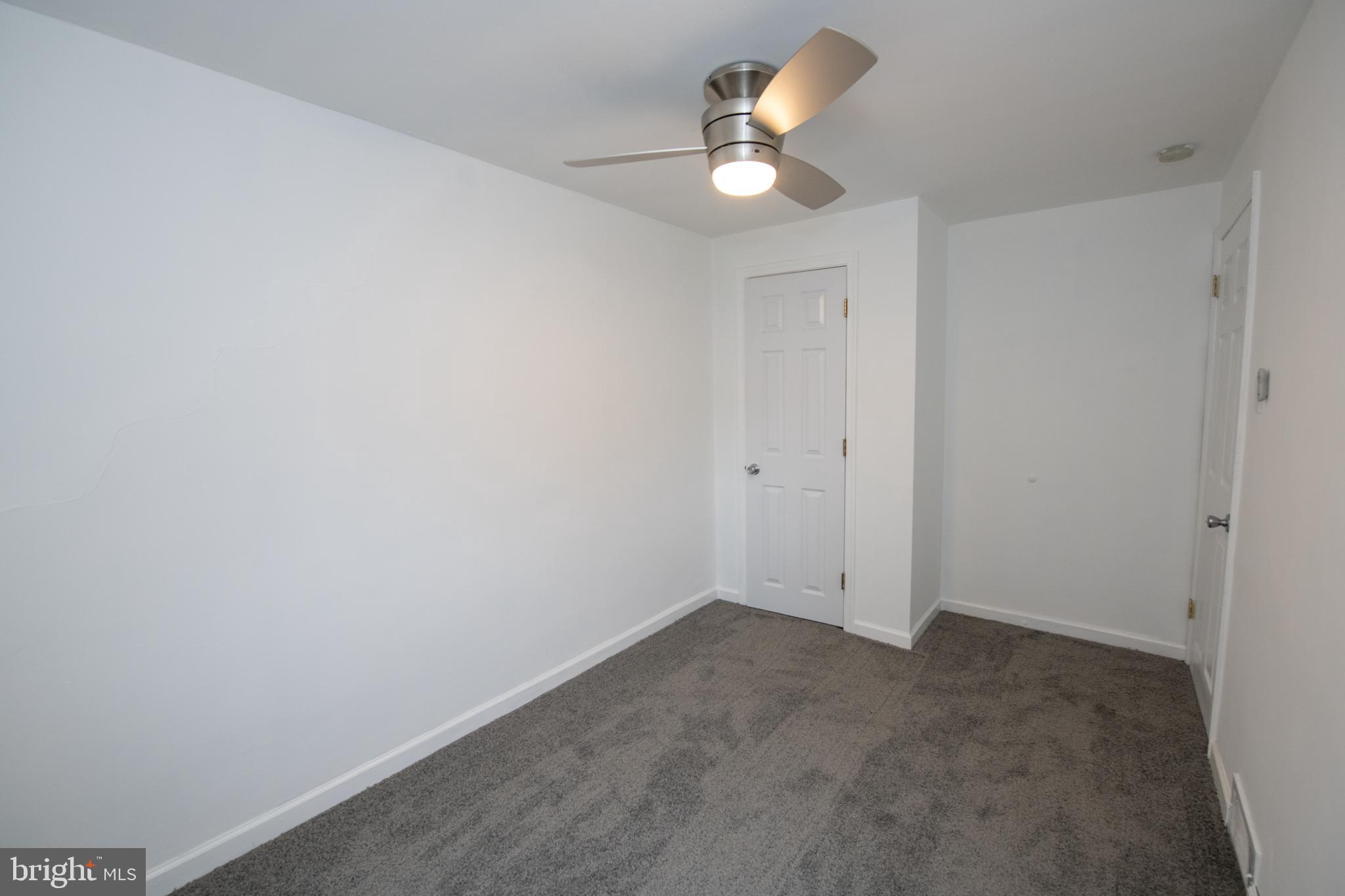 784 Bennington Road Folcroft, PA 19032 - Photo 21 of 36 an empty room with a window