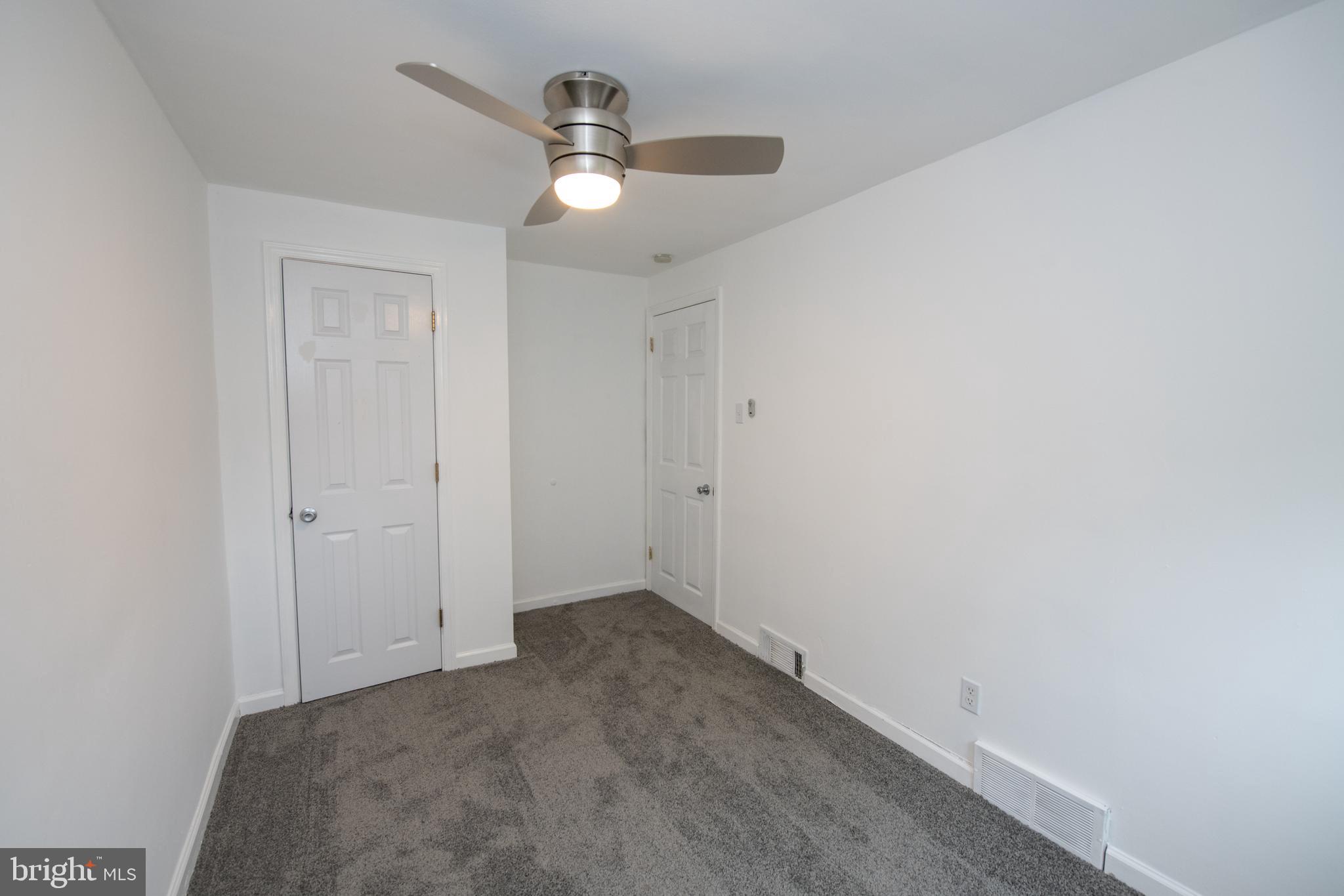 784 Bennington Road Folcroft, PA 19032 - Photo 23 of 36 an empty room with a mirror