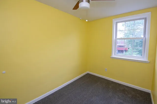 an empty room with a window