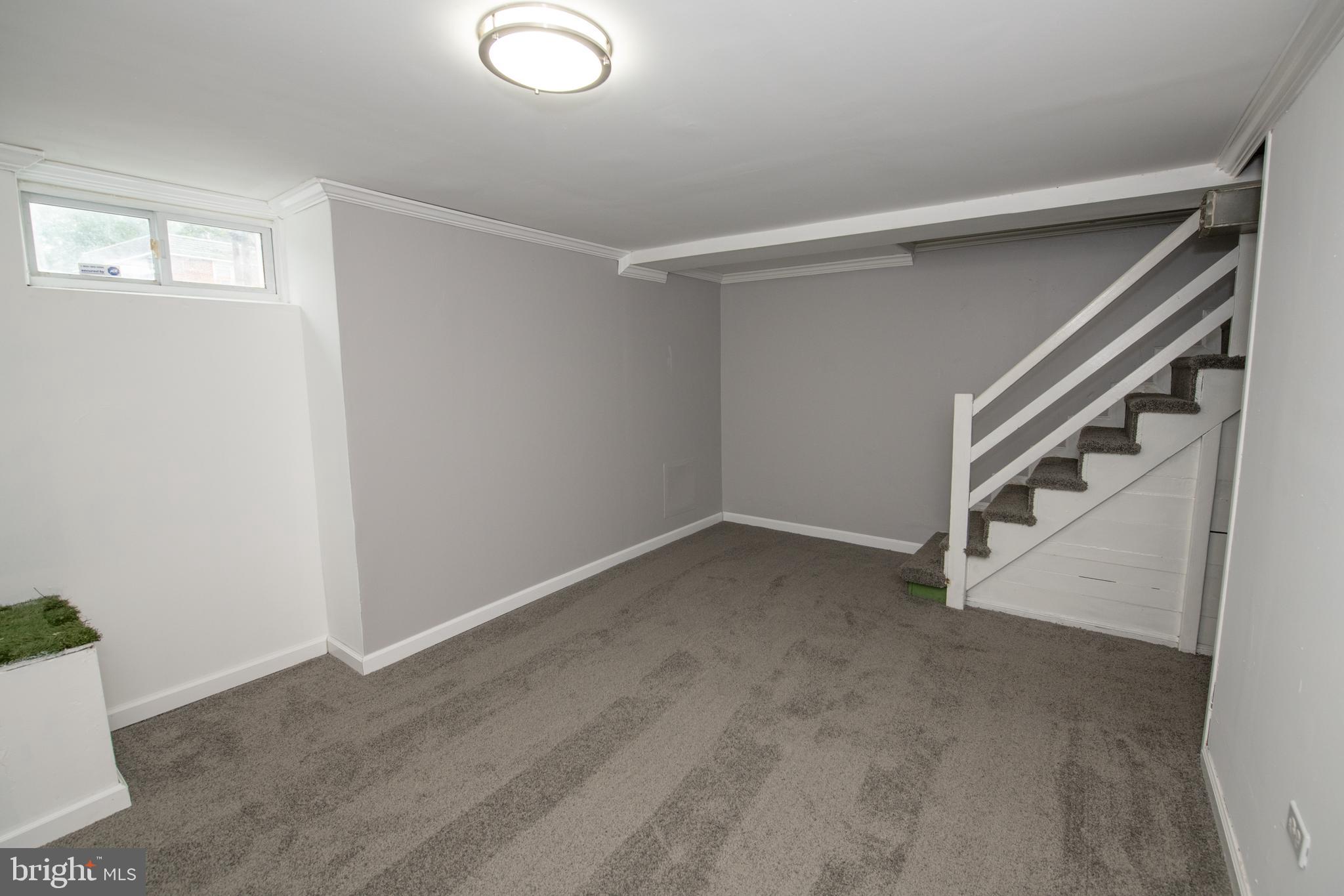 784 Bennington Road Folcroft, PA 19032 - Photo 30 of 36 a view of an empty room with windows