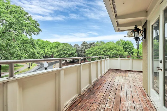 a balcony with an outdoor space