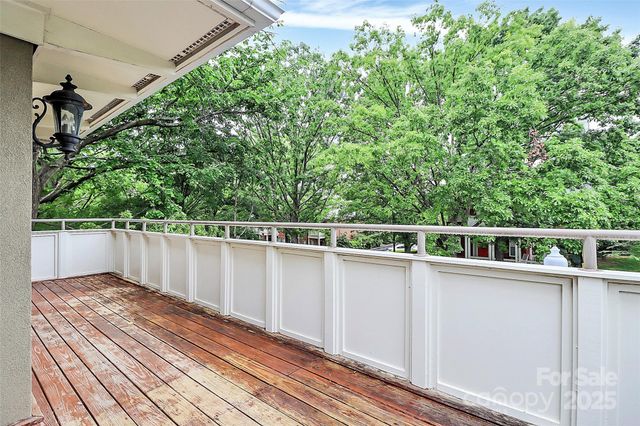 a balcony with an outdoor space