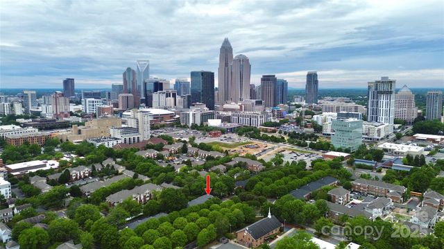 a view of a city with tall buildings