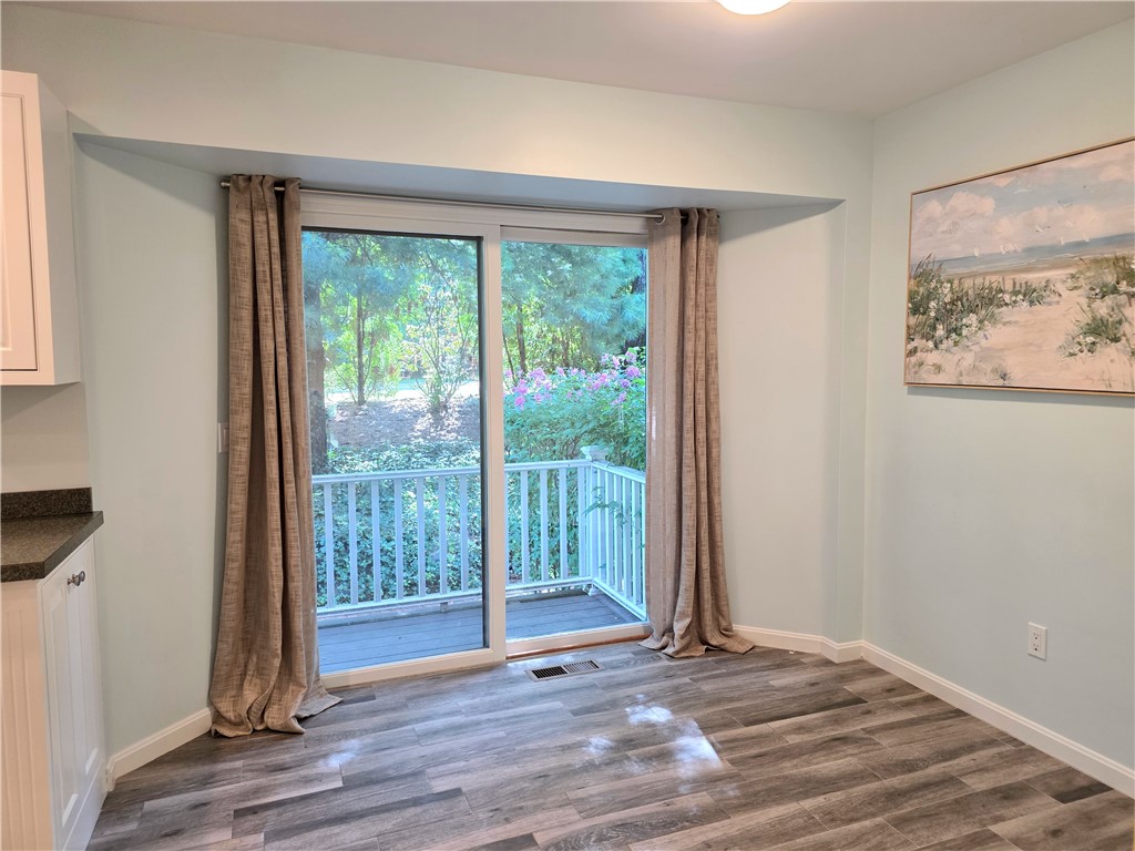 203 Dean Ridge Court Cranston, RI 02920 - Photo 15 of 29 Sliders to Deck off kitchen