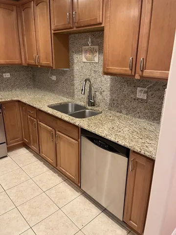 a view of a dining room with furniture wooden floor and chandelier