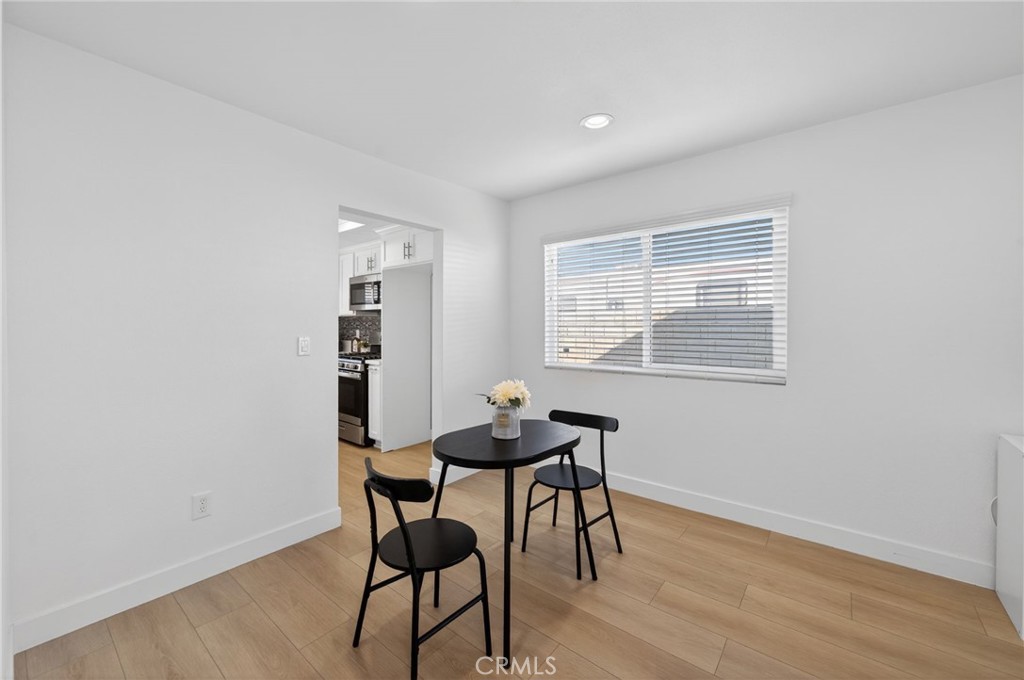 831 West Cerritos Street Rialto, CA 92376 - Photo 13 of 47 a dining room with a table and chairs
