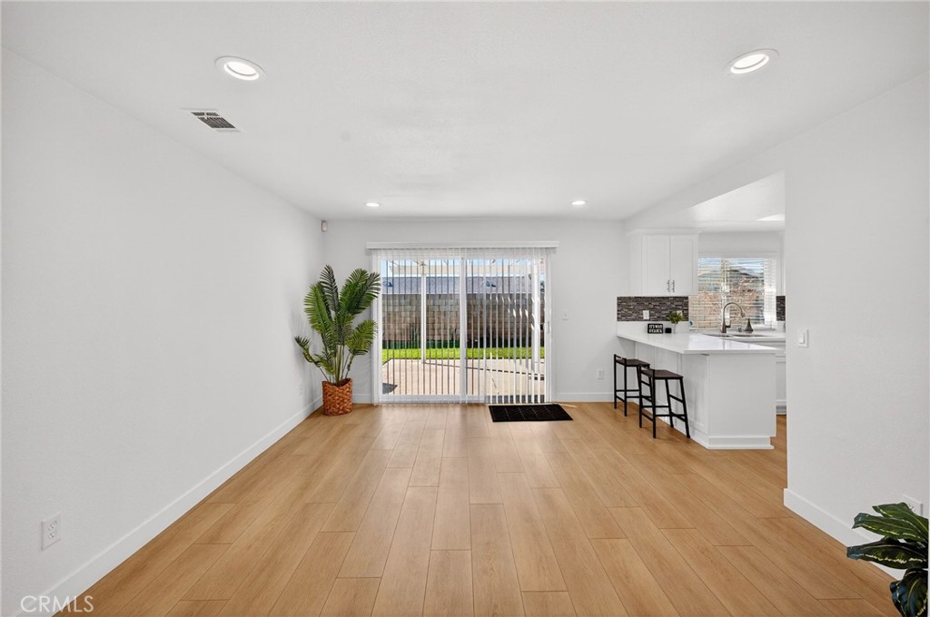 831 West Cerritos Street Rialto, CA 92376 - Photo 20 of 47 a view of work space with windows and hardwood floor