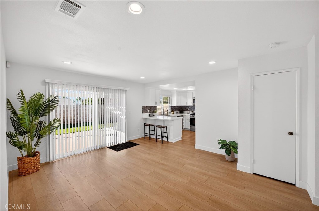 831 West Cerritos Street Rialto, CA 92376 - Photo 21 of 47 a living room with furniture and a potted plant